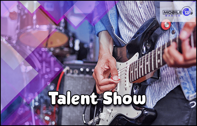 A person performing at a talent show with an electric guitar.